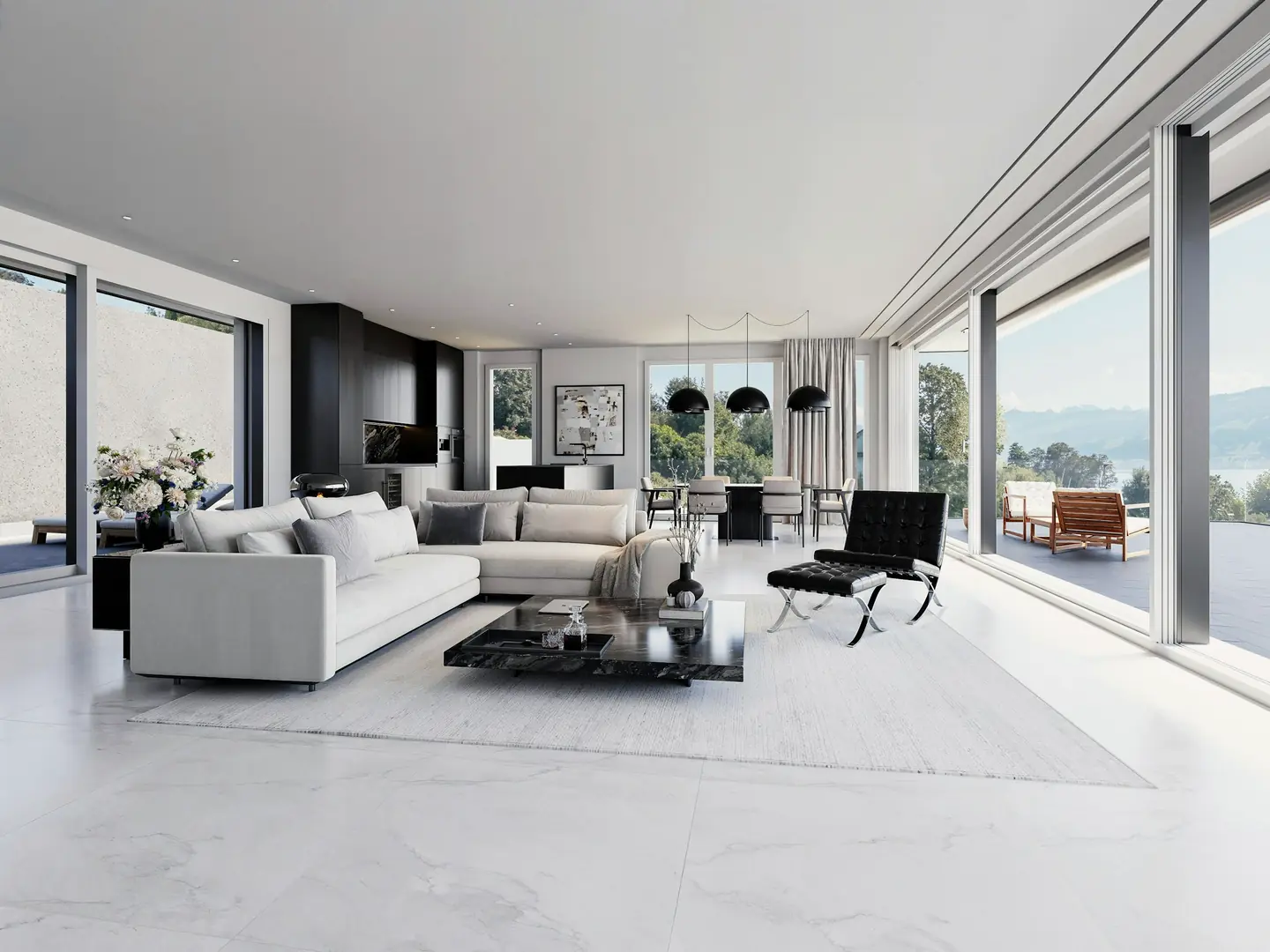A long white living room glazed on two sides, the sea beyond
